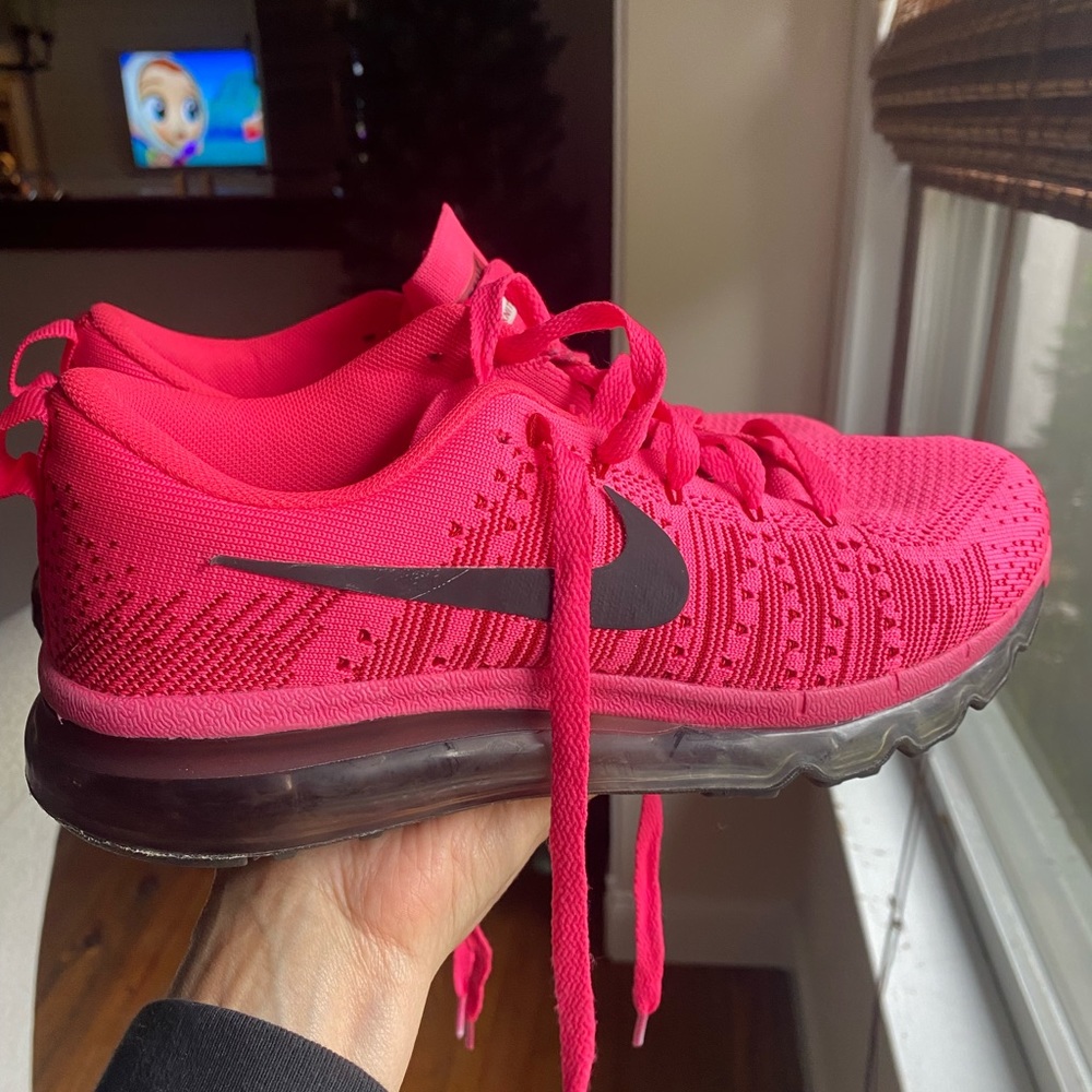 Hot pink Nike Flyknit Max sneakers